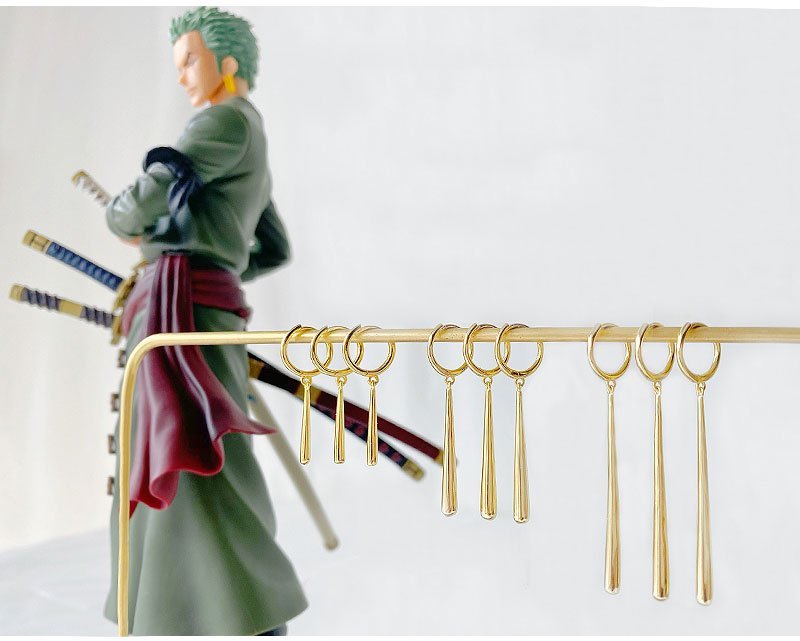 Three different lengths and sizes of gold zoro earrings