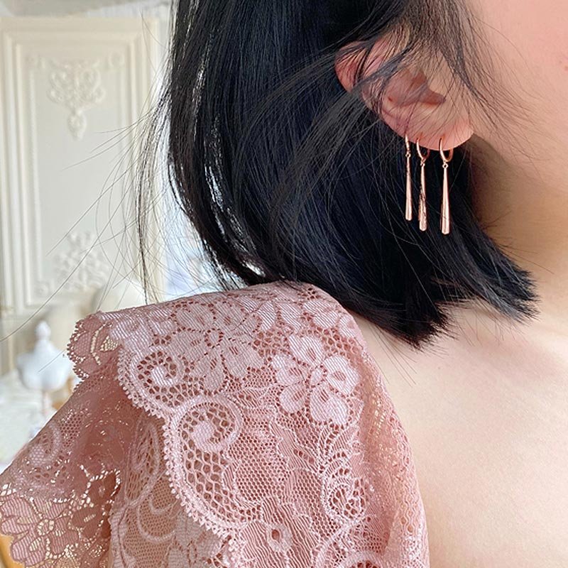 Three rose gold zoro earrings with ears